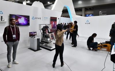 people using VR headsets at an exhibition