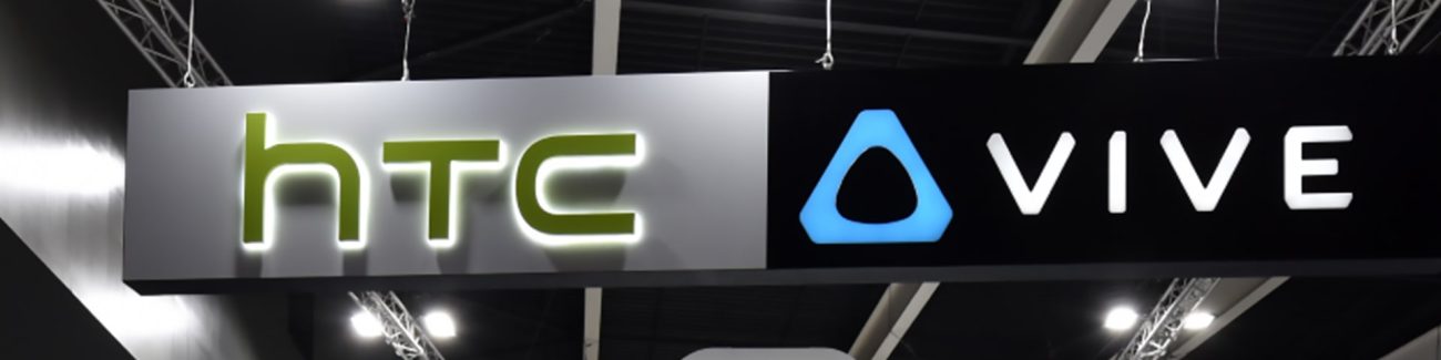 HTC logo back lit with back lit VIVE logo on exhibition stand